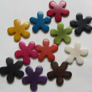 Perle de Tagua en forme de fleur. Ivoire végétal